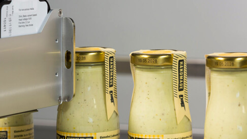 Inkjet printing on metal bottle caps