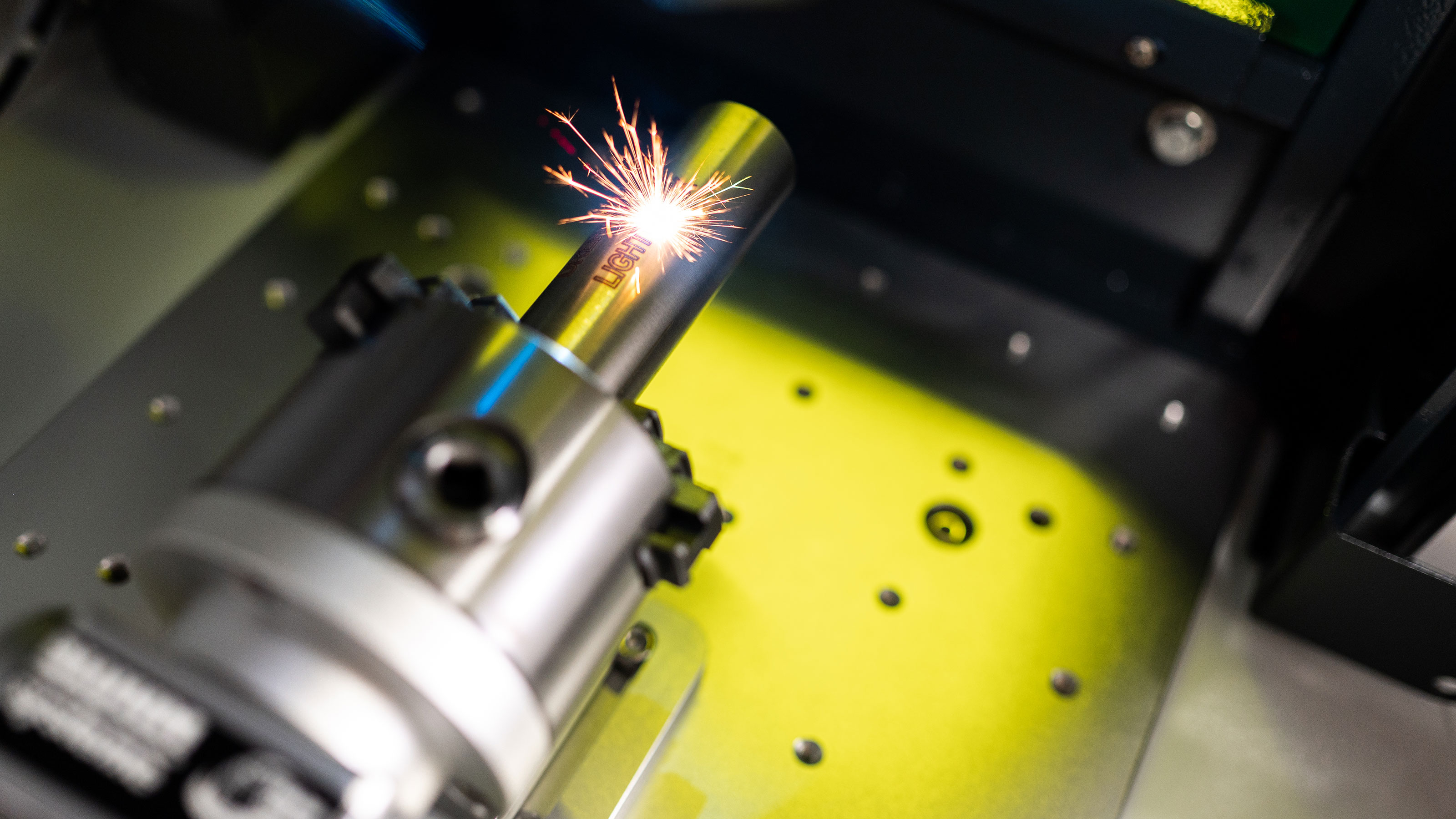 Laser marking system integrated into a machine