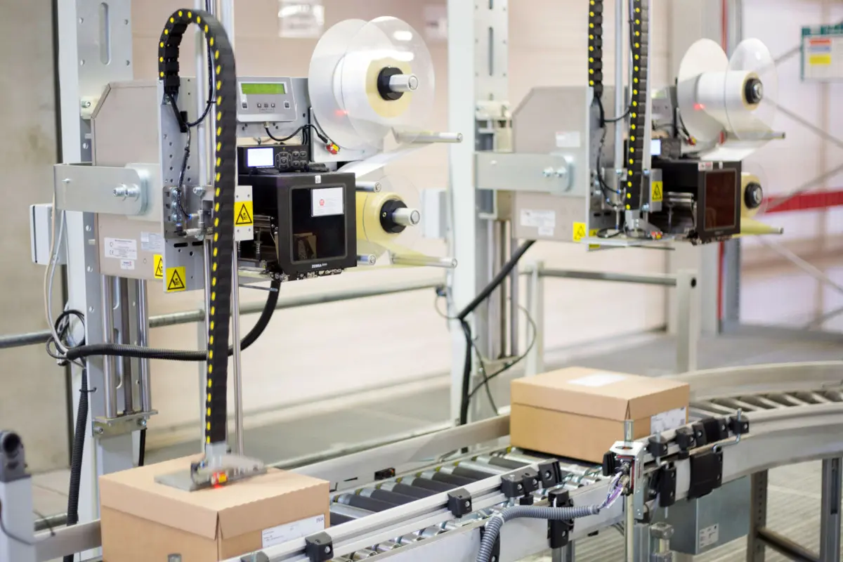 High speed labeling systems for logistics and shipping
