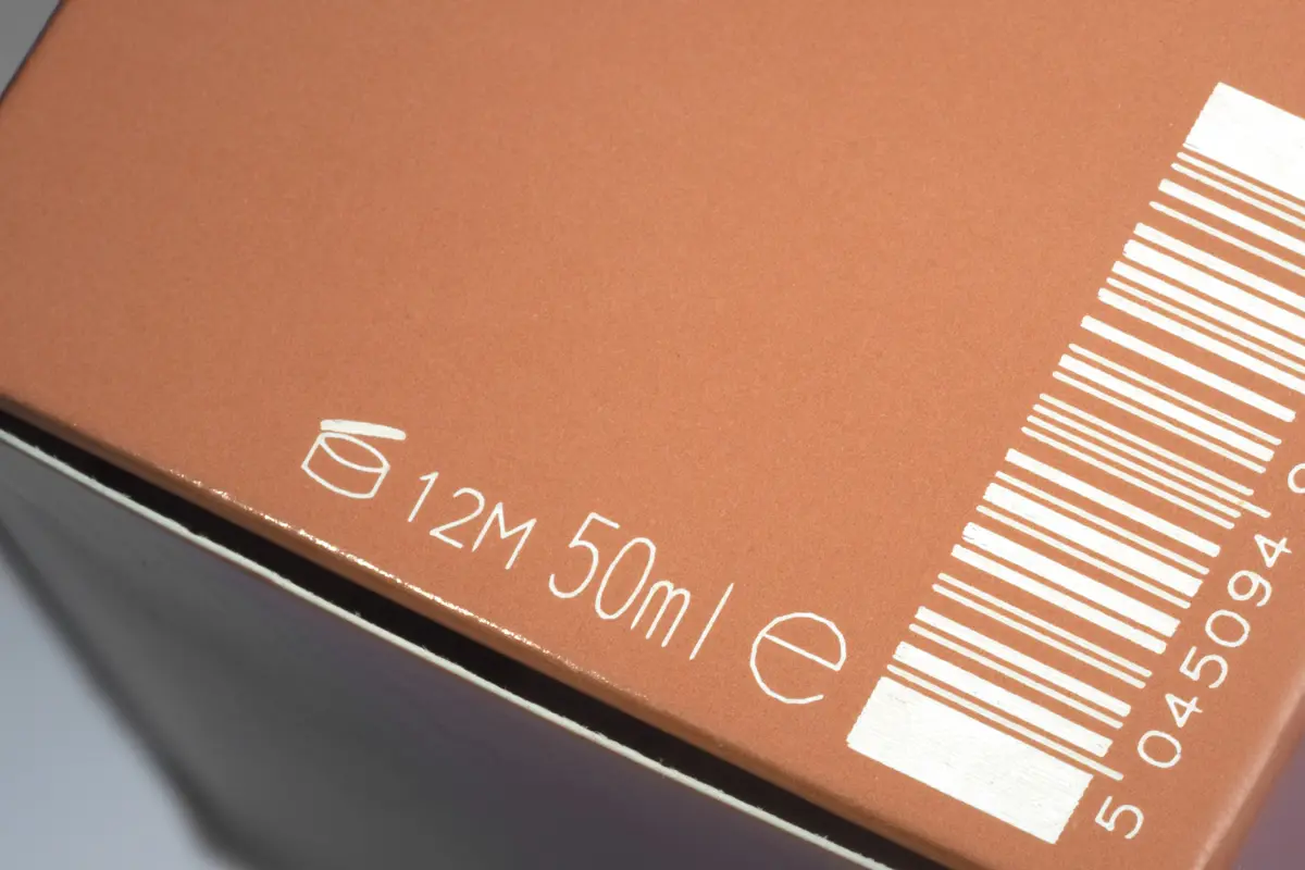 White laser marking on cardboard