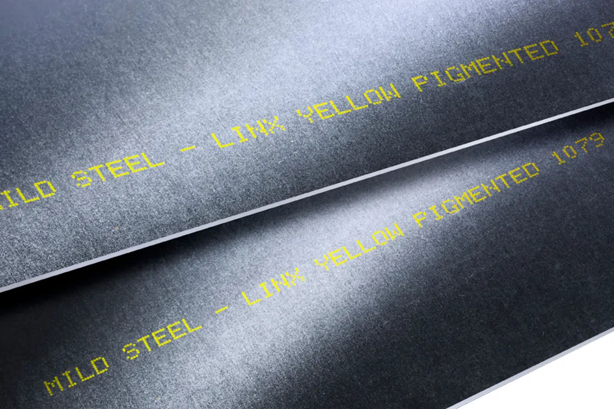Structural steel marked with yellow pigmented ink